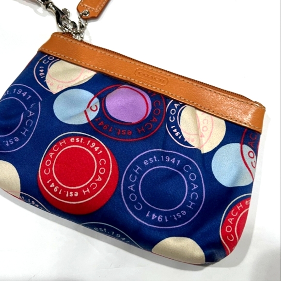 Coach Handbags - Coach Leah Polka Dot Wristlet in Blue Red Cream and Purple medium size EUC